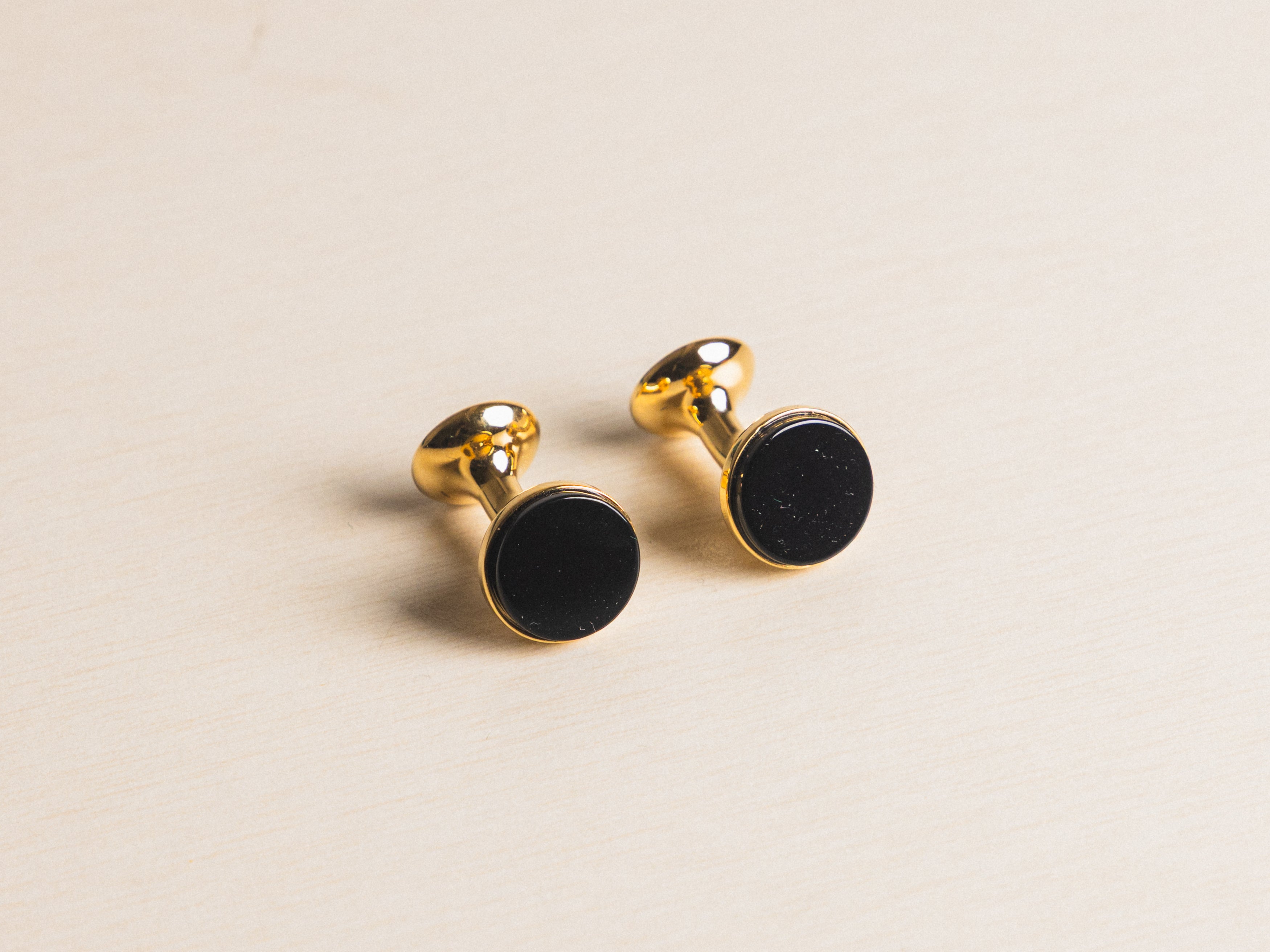 Onyx Bow Gold Cufflinks